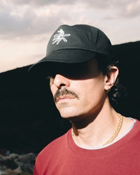 Trail of sunlight black baseball cap