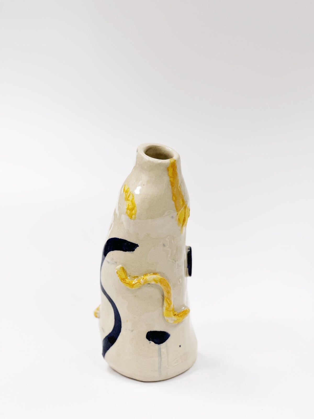 Ceramic vase with a blue and yellow pattern
